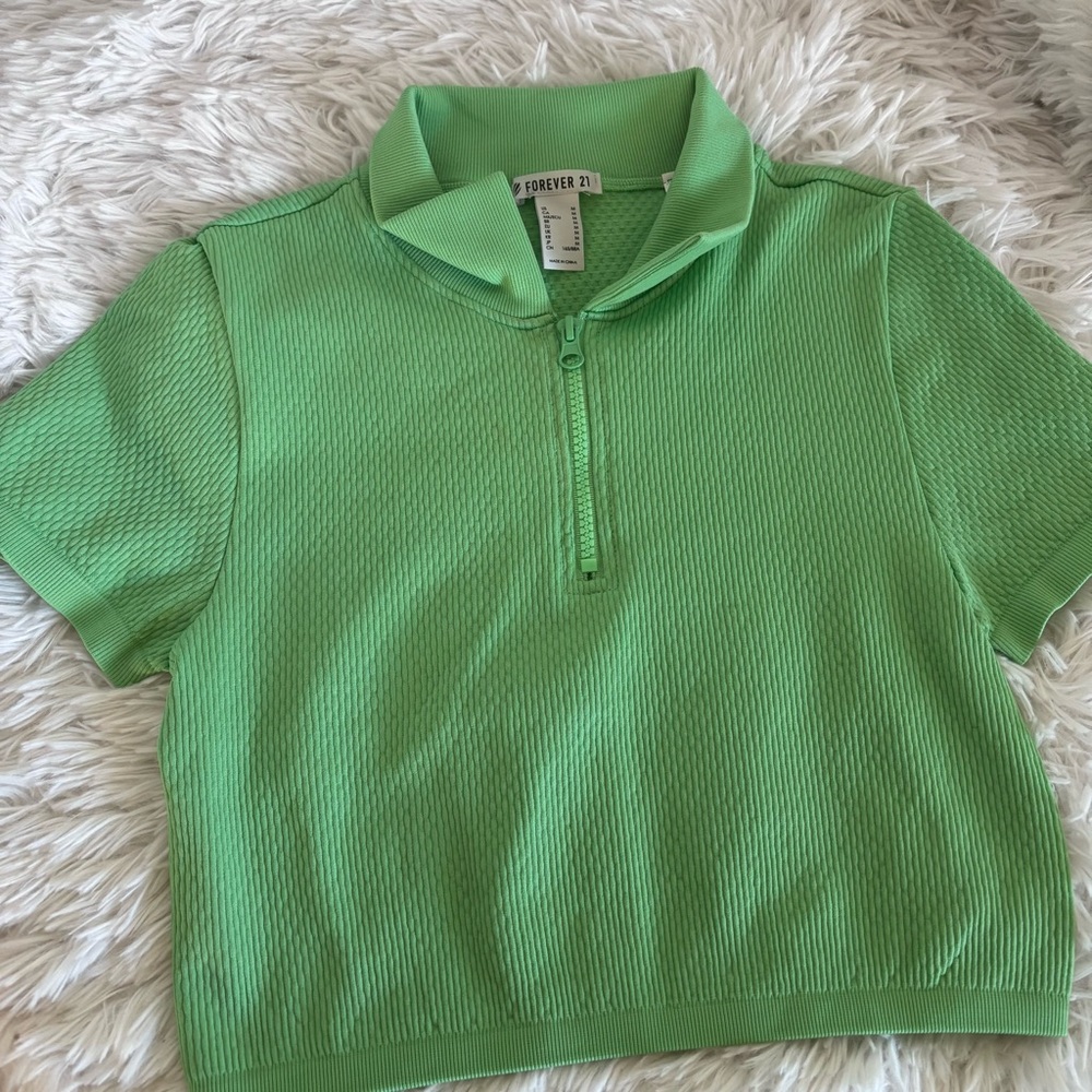 Green cropped half zip up top. Forever 21 size medium